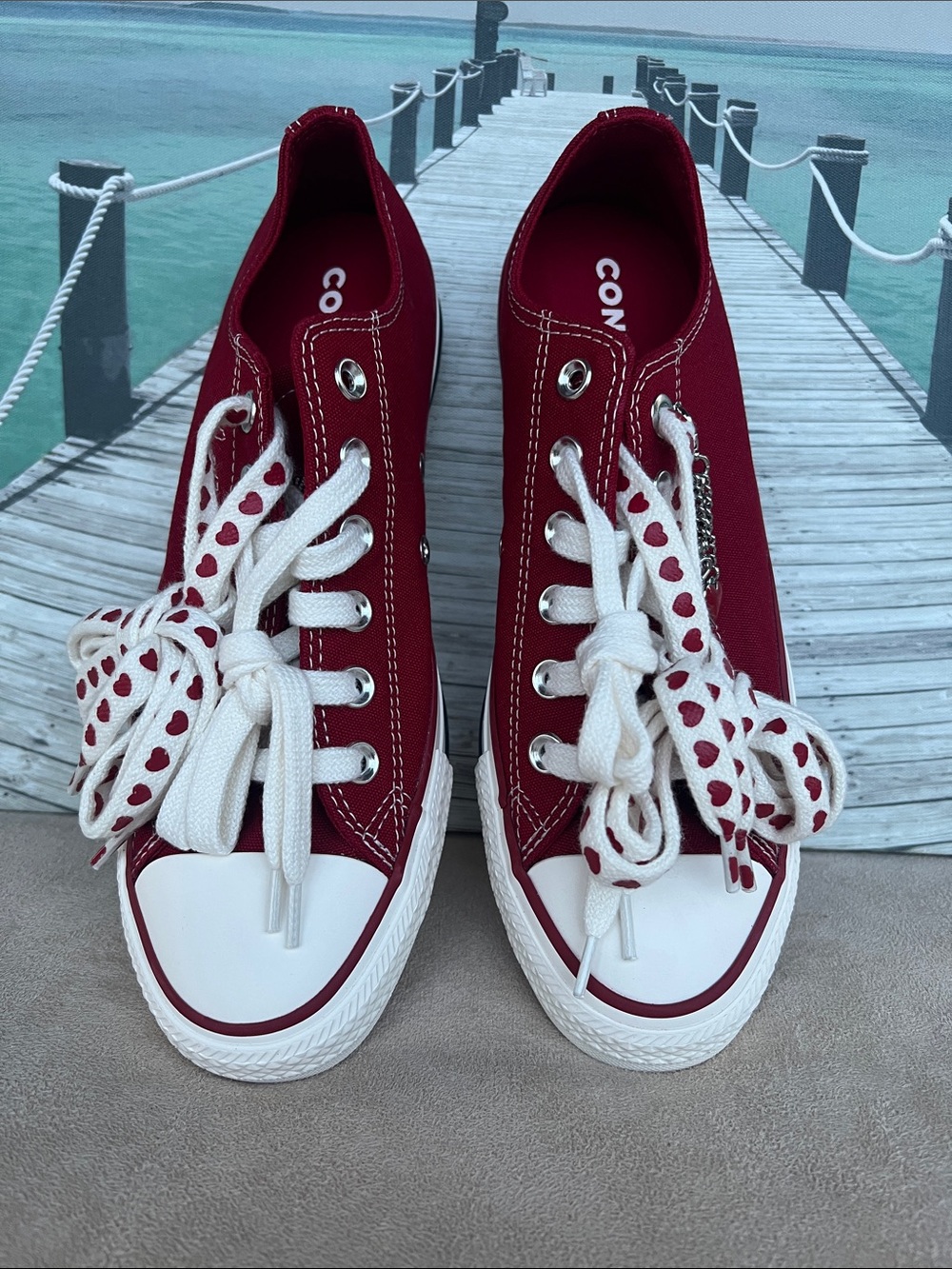 Converse Women's Low Top Sneakers in Burgundy with Heart-Print Laces
